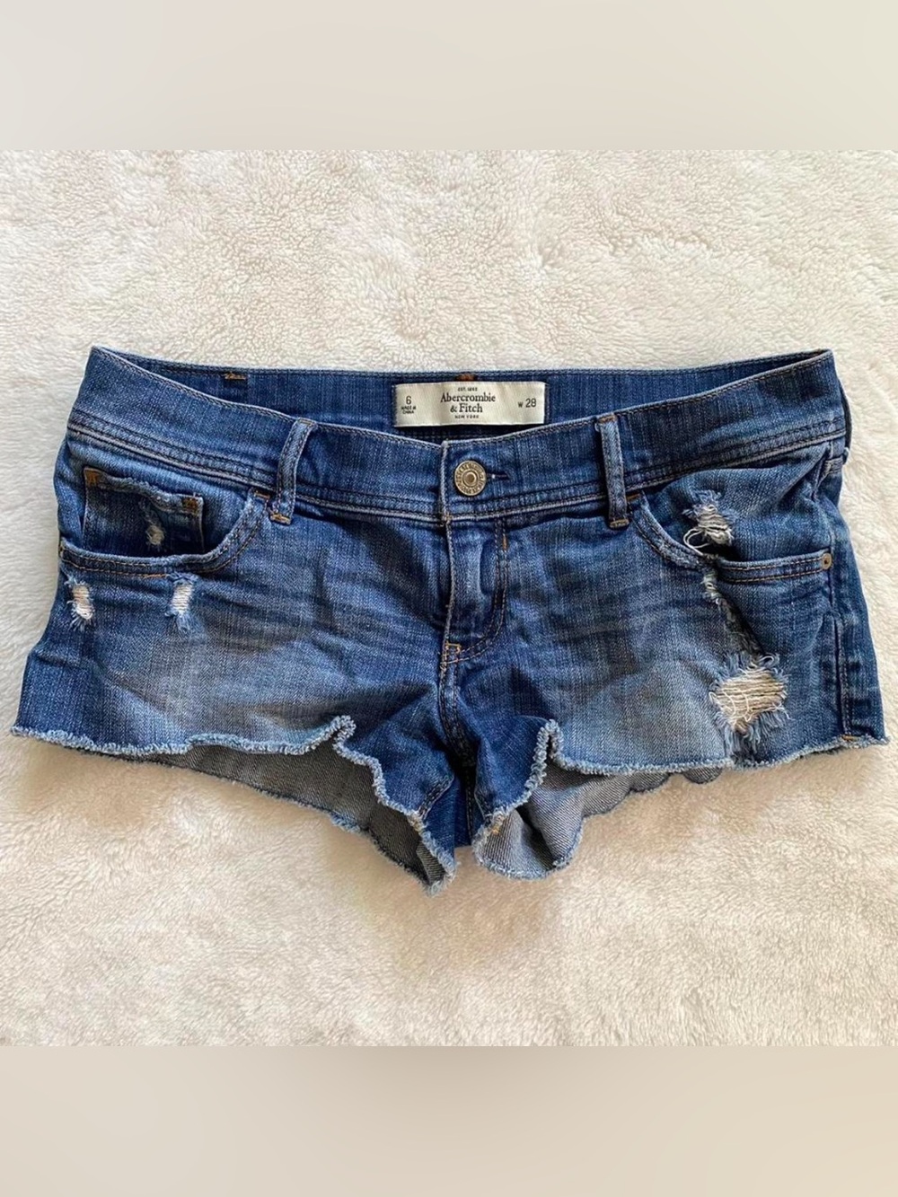Abercrombie and Fitch ultra low rise denim blue jean distressed short shorts 6